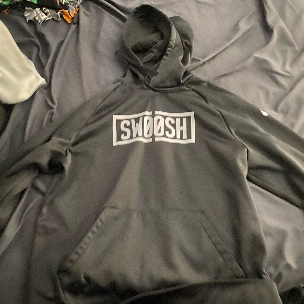 Black Nike “Swoosh” sweatshirt